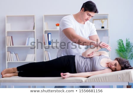 Stockfoto: Chiropractor Massage The Female Patient