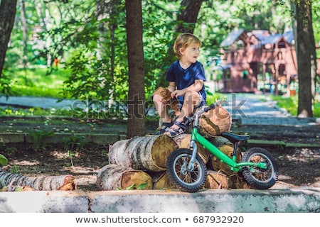 Foto stock: Little Boy And His Bicycle Preschool Childs First Day On The Bike The Joy Of Movement