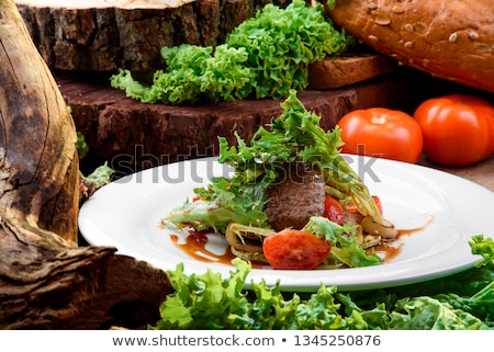 Stockfoto: Meat And Vegetables Salad Decorated With Teriyaki Sauce