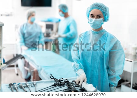 Stock photo: Surgeon Preparing In Operating Room