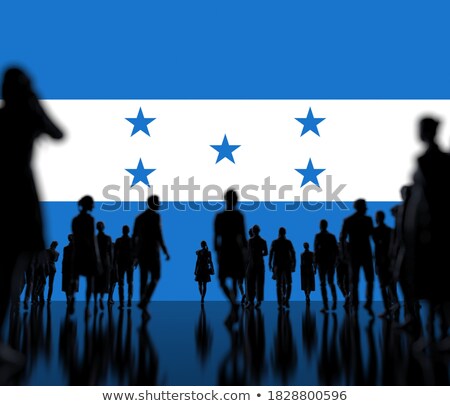 ストックフォト: Man With Flag Of Honduras In A Crowd