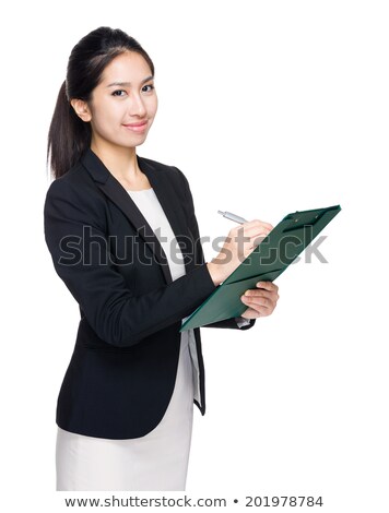 Stock photo: Attractive Young Asian Businesswoman Taking Notes