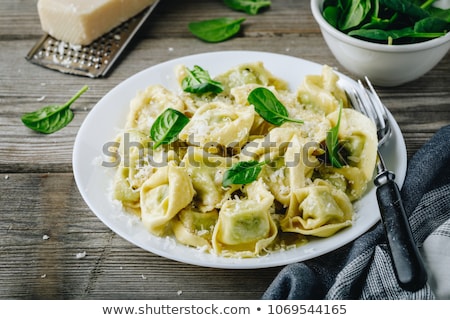 Foto stock: Homemade Tortellini With Spinach Cheese And Ricotta