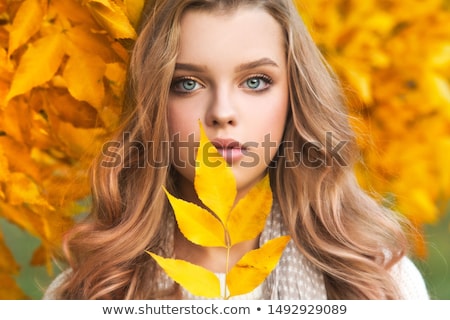[[stock_photo]]: Happy Blond Girl Posing In Autumn Park