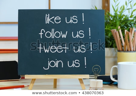 Foto d'archivio: Join Us - Text On A Blackboard