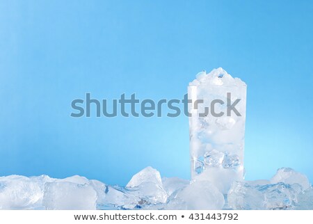 Foto stock: Glass Of Cold Mineral Water With Ice Cubes On White Background