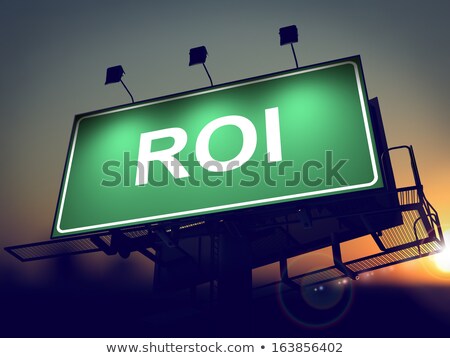Foto stock: Roi - Billboard On The Sunrise Background
