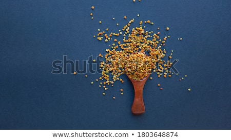 Stok fotoğraf: Bee Pollen In Wooden Spoon Copy Space