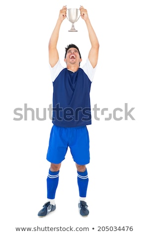 Stock fotó: Football Player In Blue Holding Winners Cup