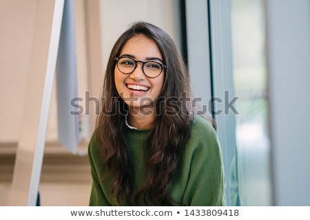 Stock fotó: Young Beautiful Woman Smiling Happily In A Classroom