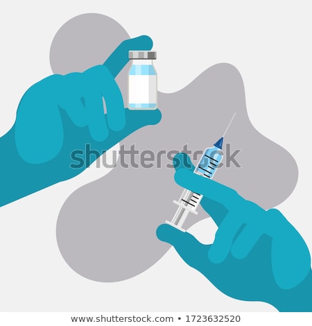 ストックフォト: Hand Holding A Syringe