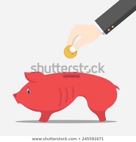 Stock fotó: Hand Dropping A Coin In A Piggy Box