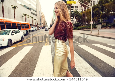 [[stock_photo]]: Blonde Woman In Dress With Bags