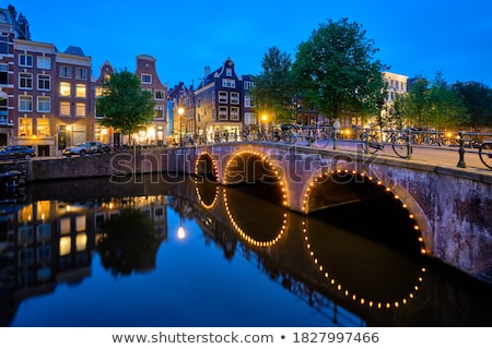 Zdjęcia stock: Amterdam Canal Bridge And Medieval Houses In The Evening