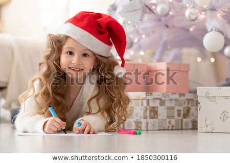 Stockfoto: Beautiful Little Baby Celebrates Christmas New Years Holidays Baby In A Christmas Costume