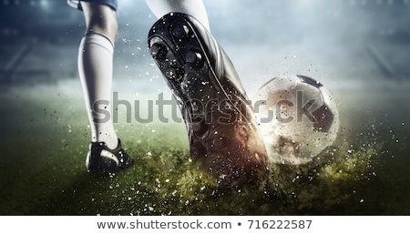 ストックフォト: Boy Kicking Soccer Ball