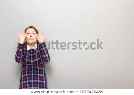 ストックフォト: Woman Protecting Herself With Raised Hands