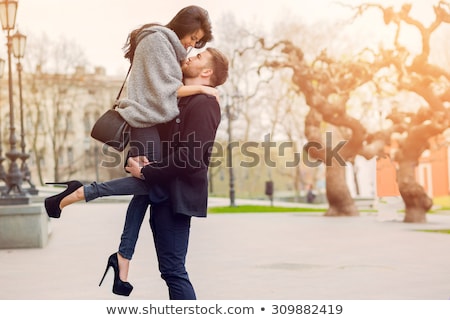 Foto stock: Beautiful Happy Young Couple With Spring Background