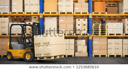 Stok fotoğraf: Industrial Forklift With A Load Of The Boxes