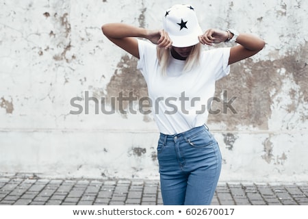 Foto d'archivio: Lady In Baseball Cap