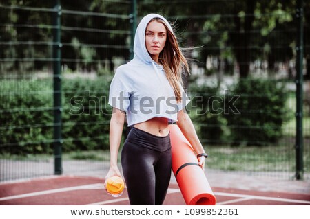 Сток-фото: Sports Woman Holding Shaker And Yoga Mat