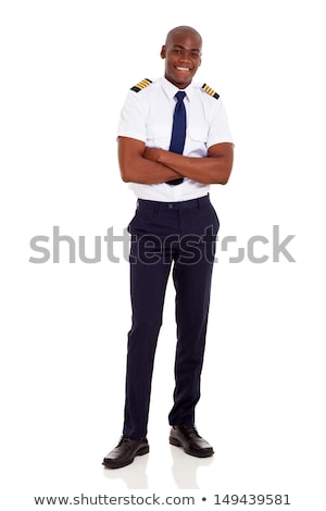Foto stock: Young African Pilot Standing With Folded Arms