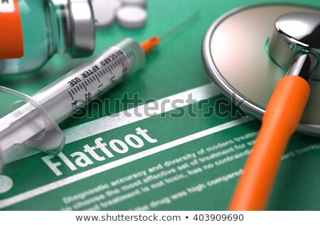 Foto stock: Flatfoot Medical Concept On Green Background