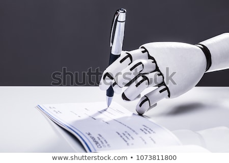 Сток-фото: Robotic Hand Signing Cheque