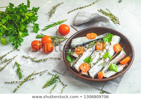 Сток-фото: Sardines Or Baltic Herring With Rosemary Thyme Parsley Tomat