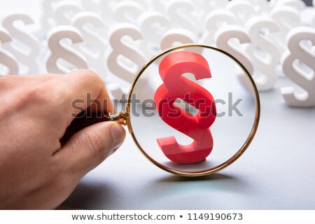 [[stock_photo]]: Person Looking At Red Paragraph Symbol