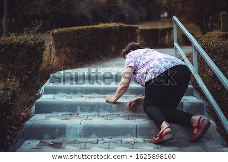 Femeie Senior în Parcul Toamnei Imagine de stoc © Madrolly