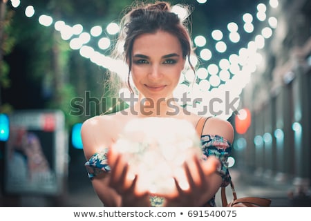 Stok fotoğraf: Portrait Of Beautiful Girl With Bokeh At Background