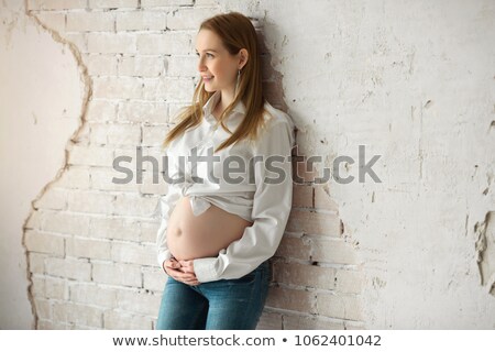 Stock fotó: Beautiful Pregnant Woman With Angel Wings