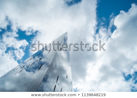 Stock photo: Facade Of Skyscraper With Reflection Of Sky