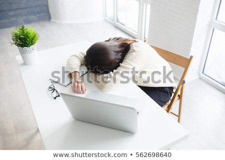 Stockfoto: Researcher Sleeping At Workplace