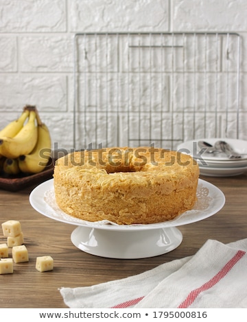 Foto stock: Fresh Tasty Sweet Piece Of Various Pieces Of Cake On A White Napkin And A Dessert Fork On A Wooden