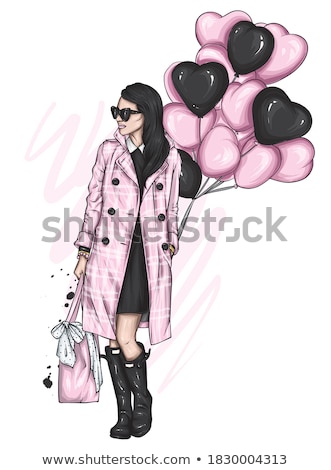 Stock photo: Girl In A Coat On The Street