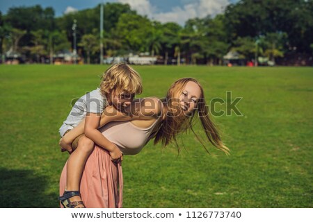 Stock fotó: Mom And Son On Background Of Padang Kota Lama Or Simply Called The Padang Is The Parade Ground And