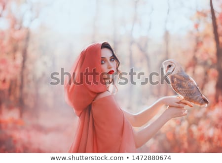 Stockfoto: Young Beautiful Woman With White Flower Over Pink