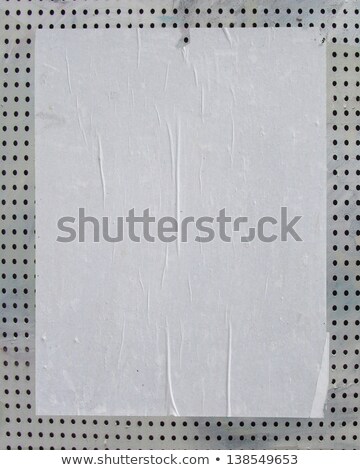 Foto stock: White Empty Street Poster On Pierced Panel