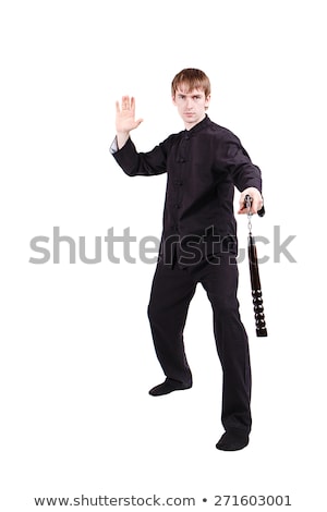 Stock fotó: Man In Martial Arts Concept With Nunchucks