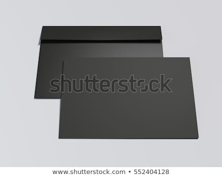 [[stock_photo]]: Black Envelope With White Blank Sheet 3d Rendering