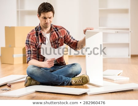 Stock foto: Repairman Holding Tool Box Installing Kitchen