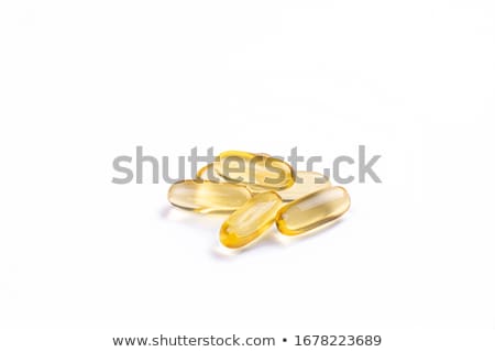 ストックフォト: Vitamin D And Golden Omega 3 Pills For Healthy Diet Nutrition F