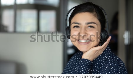 [[stock_photo]]: Woman Wearing Headphones And Microphone