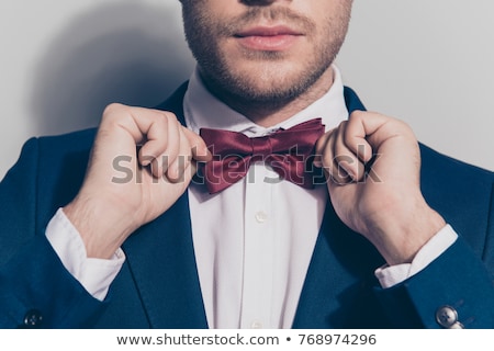 Foto stock: Elegant Macho Man In A Bow Tie