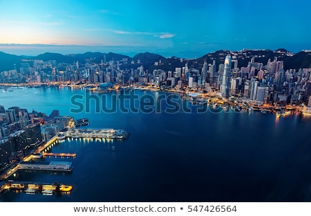 Foto stock: Hong Kong City Skyline By Ferry Pier Panorama