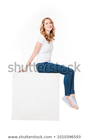 Foto stock: Woman Posing On The Cube