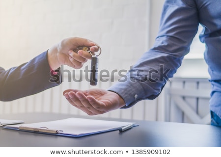 Stock photo: Business Man With New Car Sign