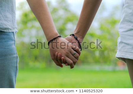 Stockfoto: Close Up Of Lesbian Couple Holding Hands